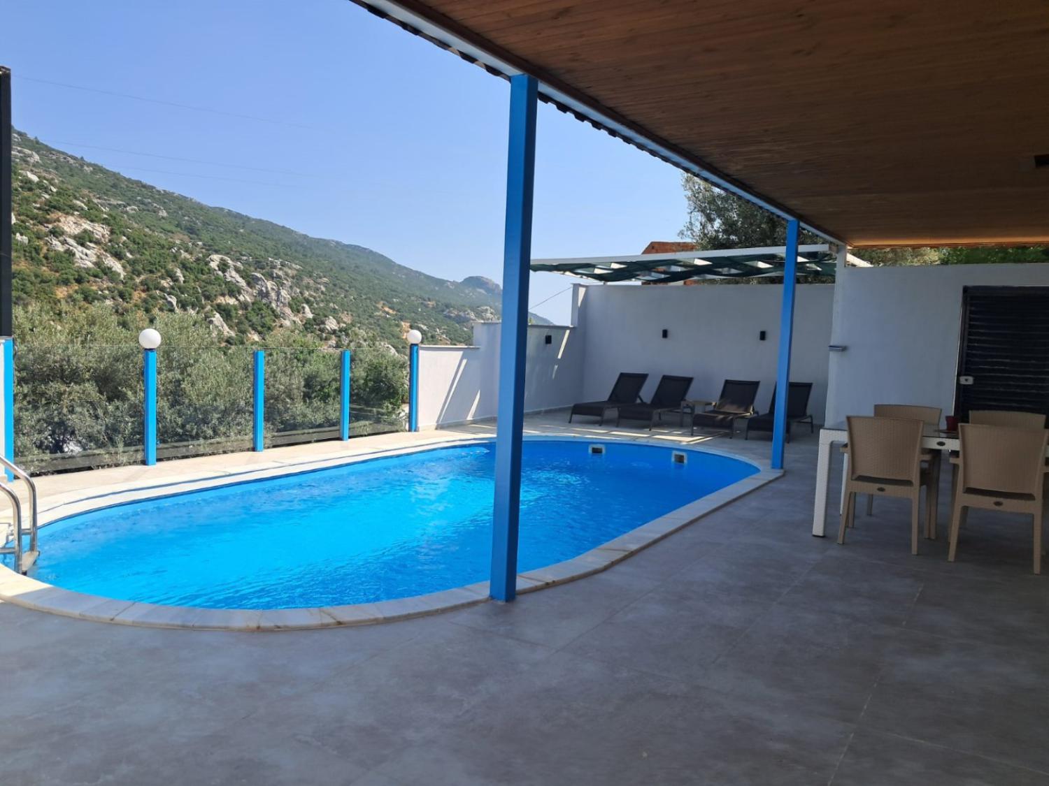 Villa Tema | Kalkan İslamlar bölgesinde bulunan 2 yatak odalı jakuzili kiralık özel havuzlu villa